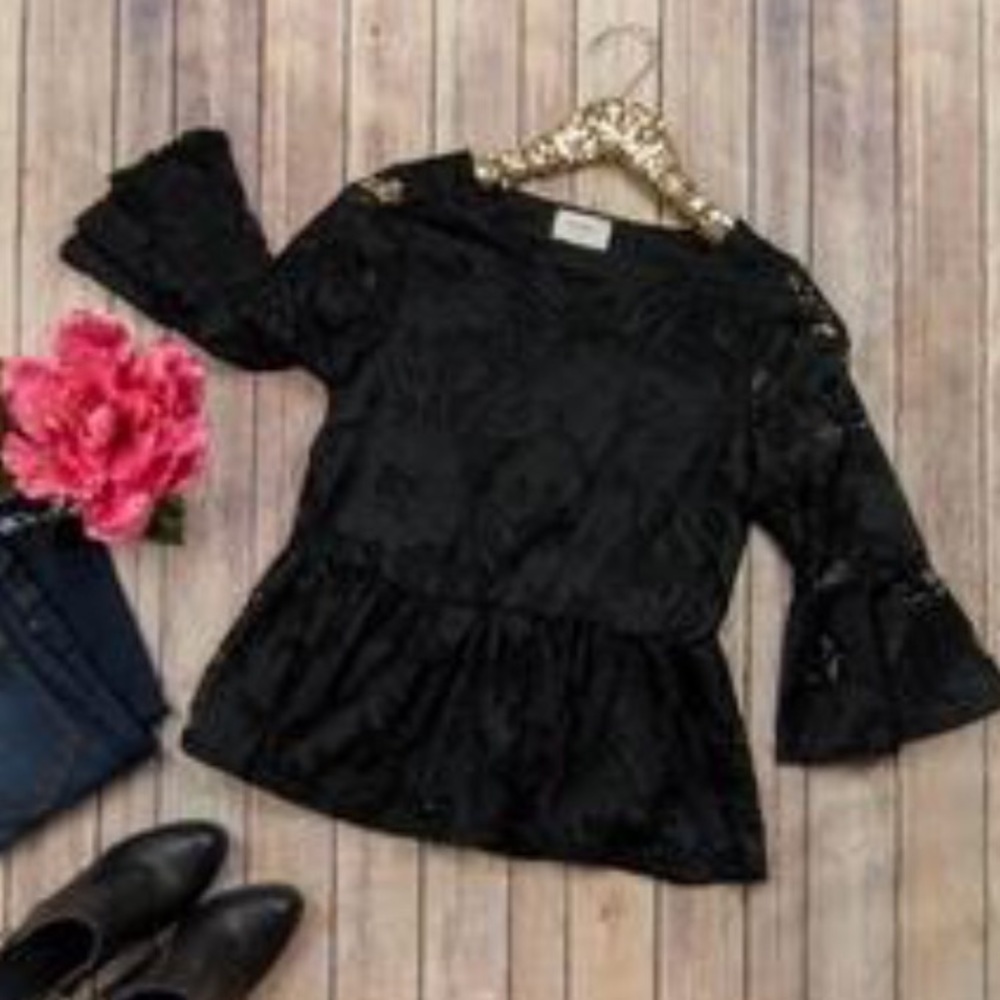 Boutique Black is lace Peplum.  NWOT.  Lined
